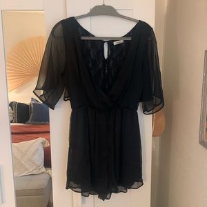 Black wrap front style lacey romper
